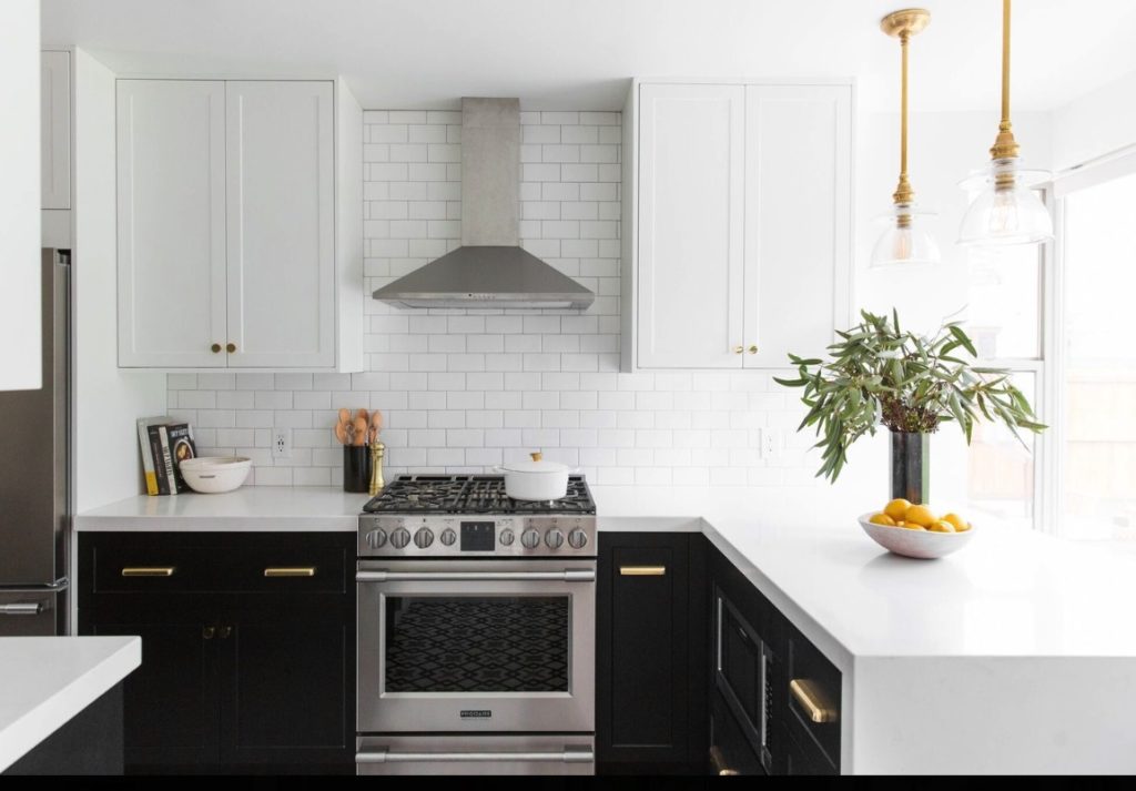 White kitchen with black lower cabinets