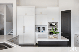 white-kitchen-gold-hardware-quartz-counter-black-island