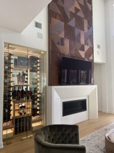 living room with two story fireplace