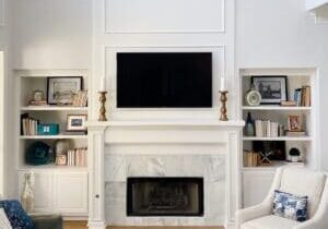 white fireplace with marble